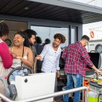 adults at a BBQ outdoor, having fun